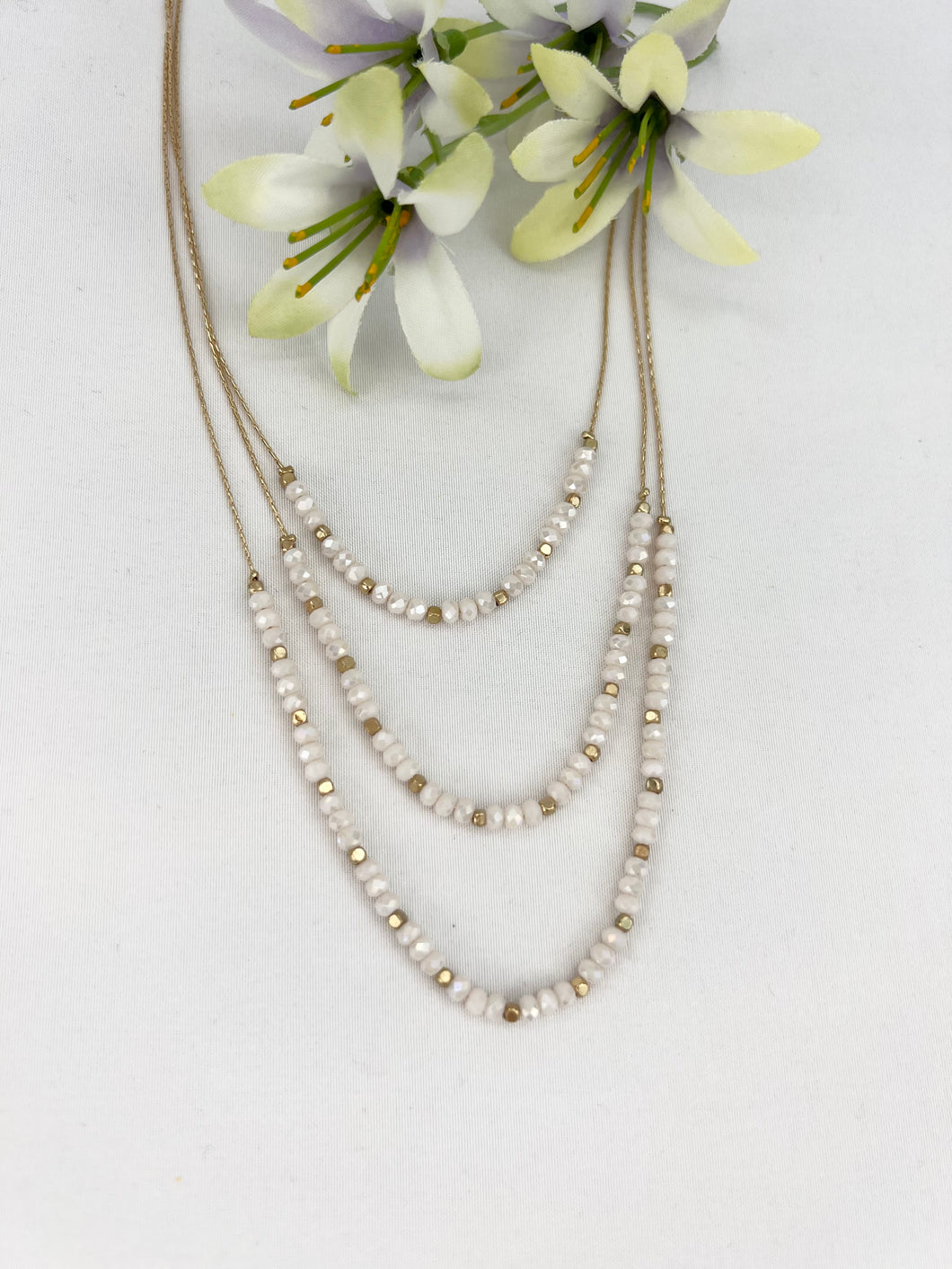 ALL DEVINE LAYERED BEADED NECKLACE